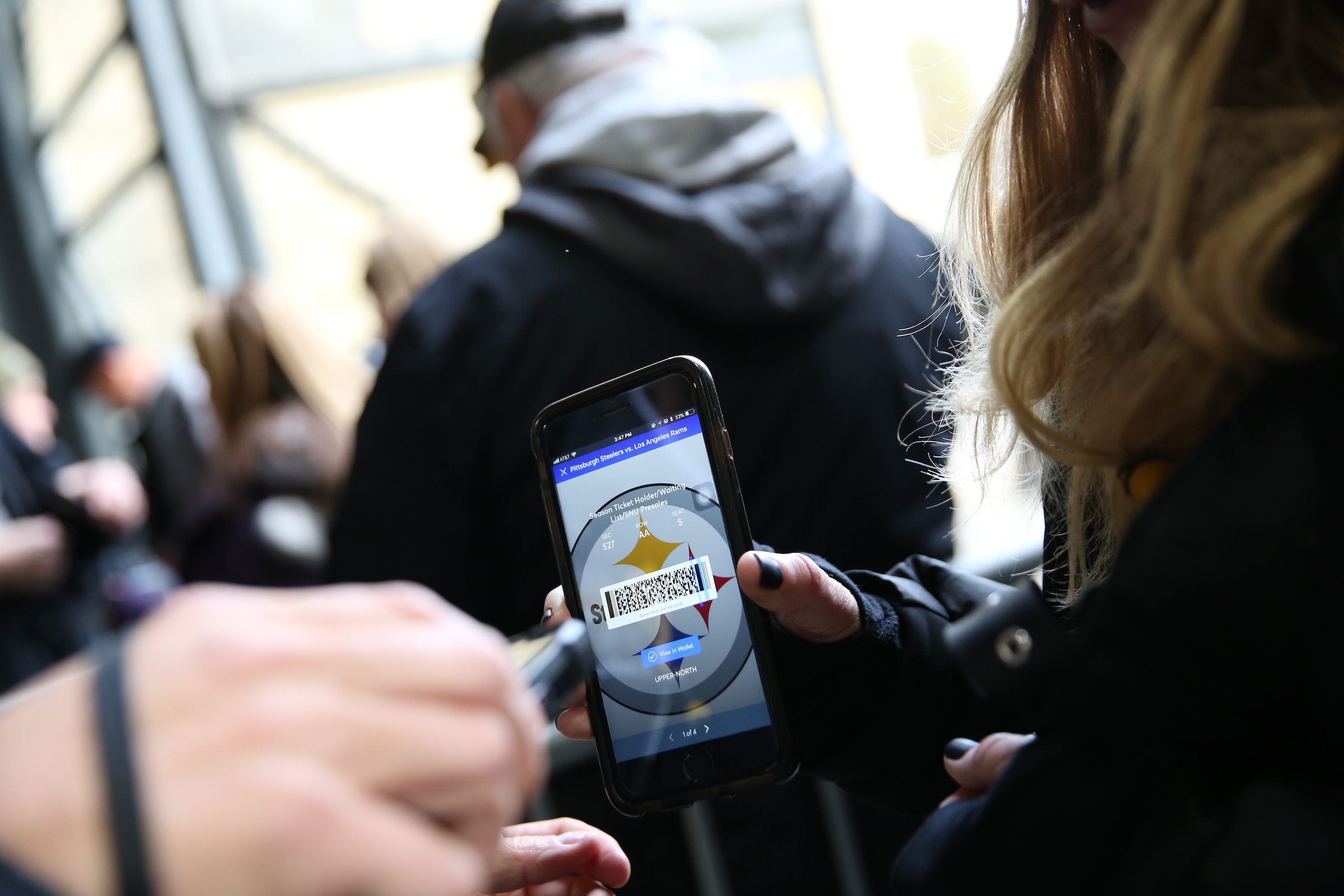 A fan's mobile ticket presented for scanning at the Acrisure Stadium gate