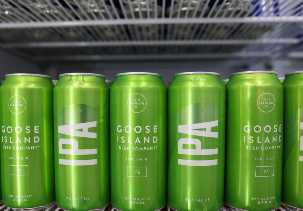 A line of Goose Island IPA beer cans at Acrisure Stadium