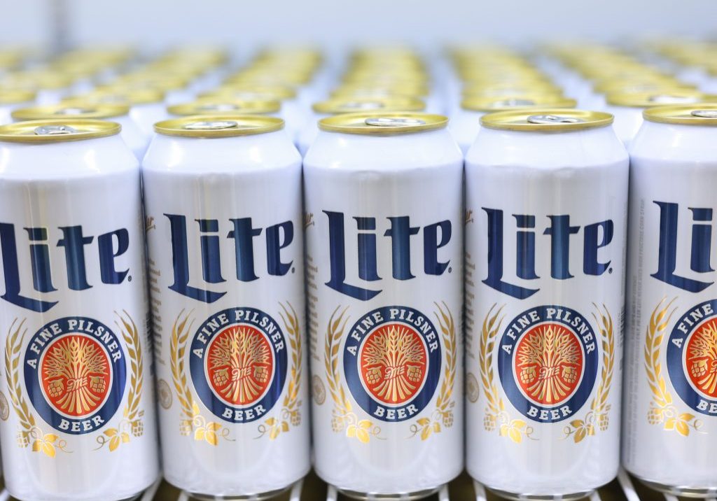 A line of Miller Lite beers in cans at Acrisure Stadium